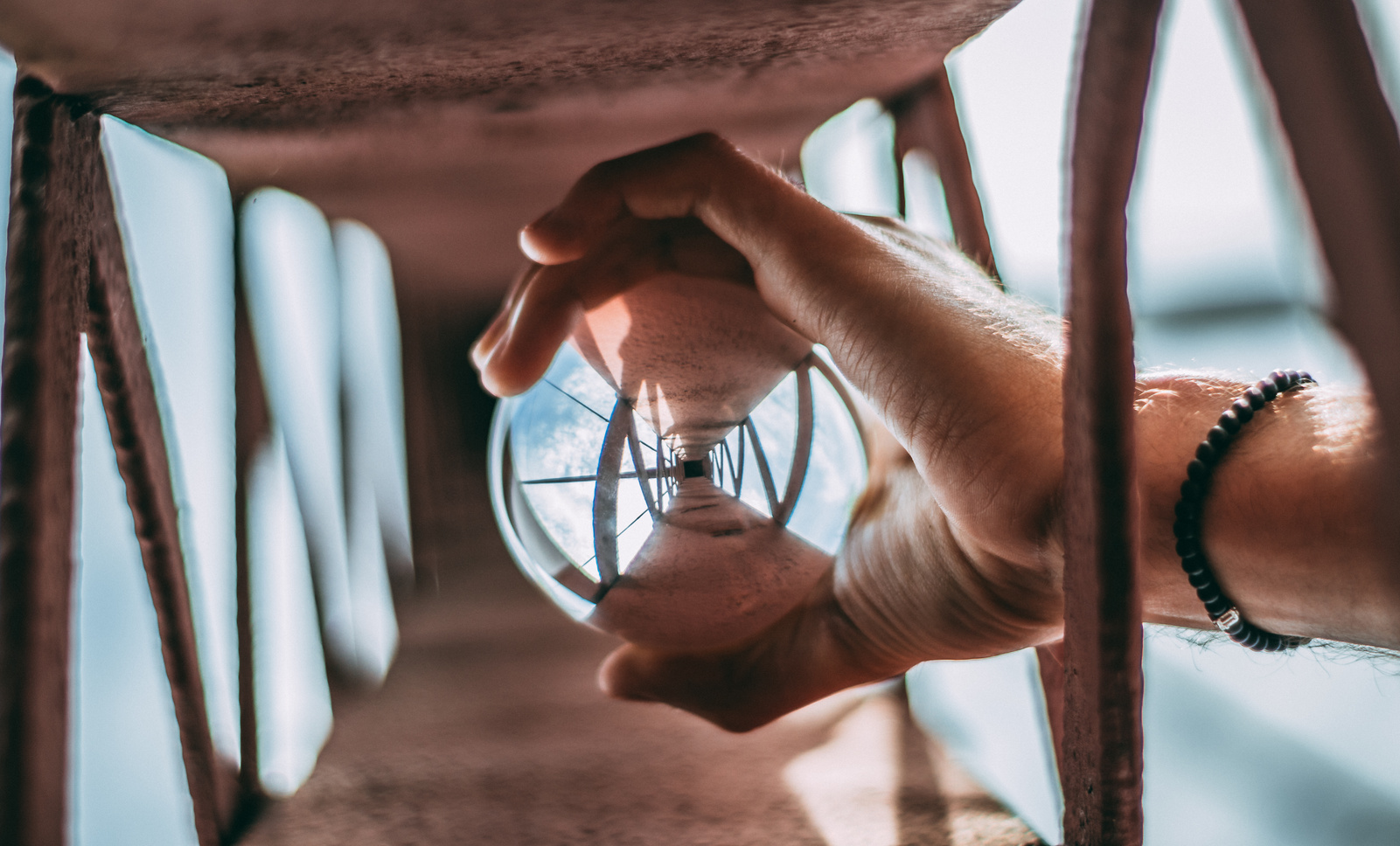 Person Holding Glass Lens